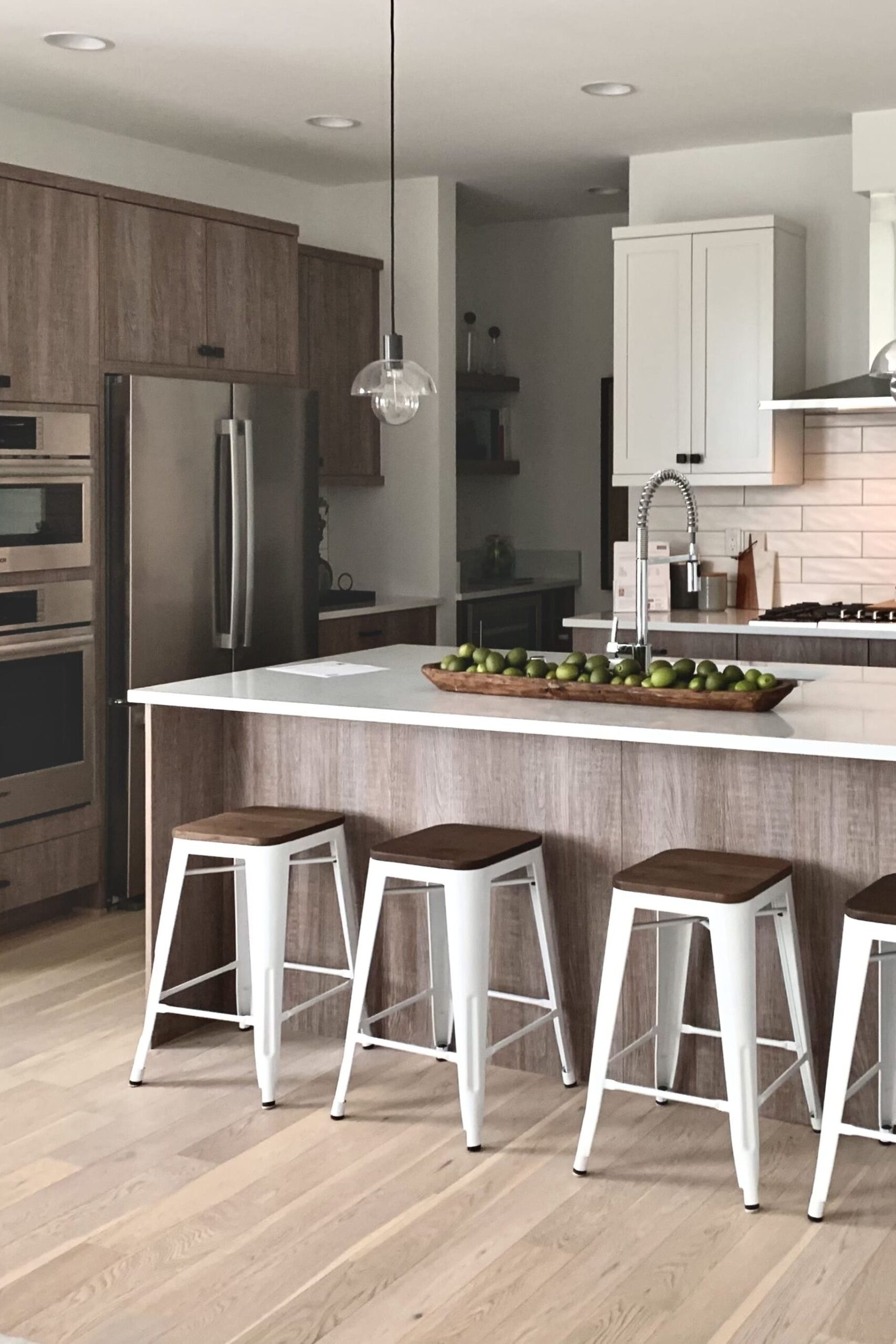 Stylish kitchen remodeled by ArtBrick, a trusted home remodeling Seattle expert, featuring modern cabinets and lighting.