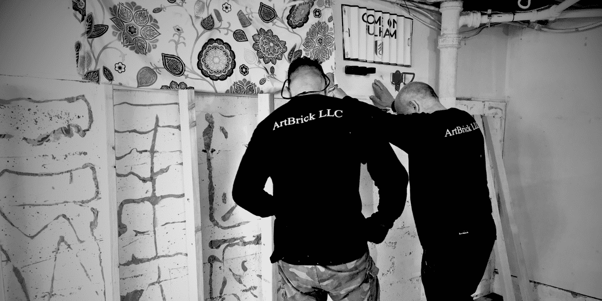 Serge and Anatolii working on framing for a remodeling project
