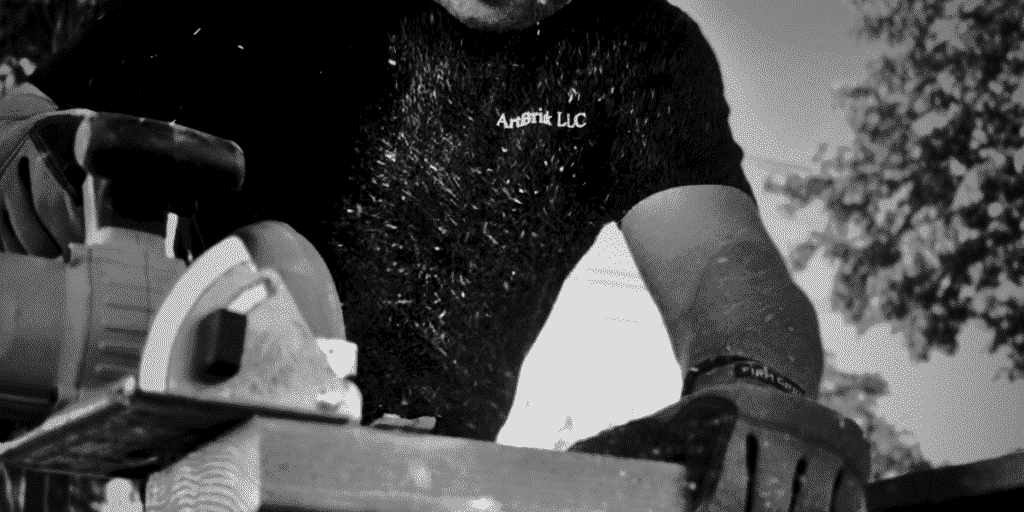 Serge is cutting wood for granite falls project