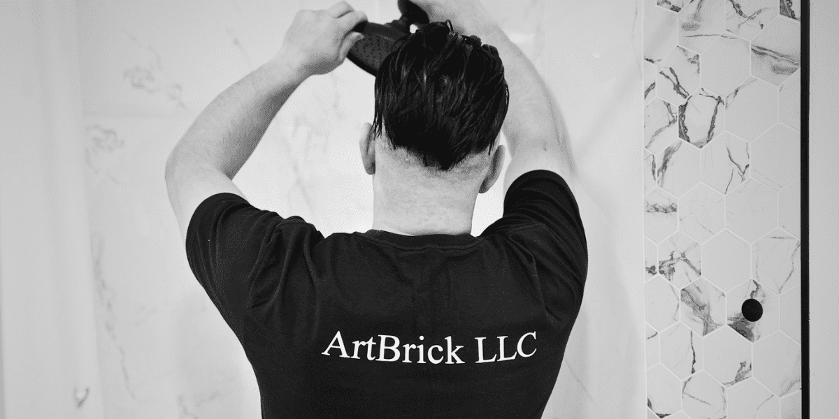 Serge is working on finishing a bathroom for a bathroom remodel project in Seattle 