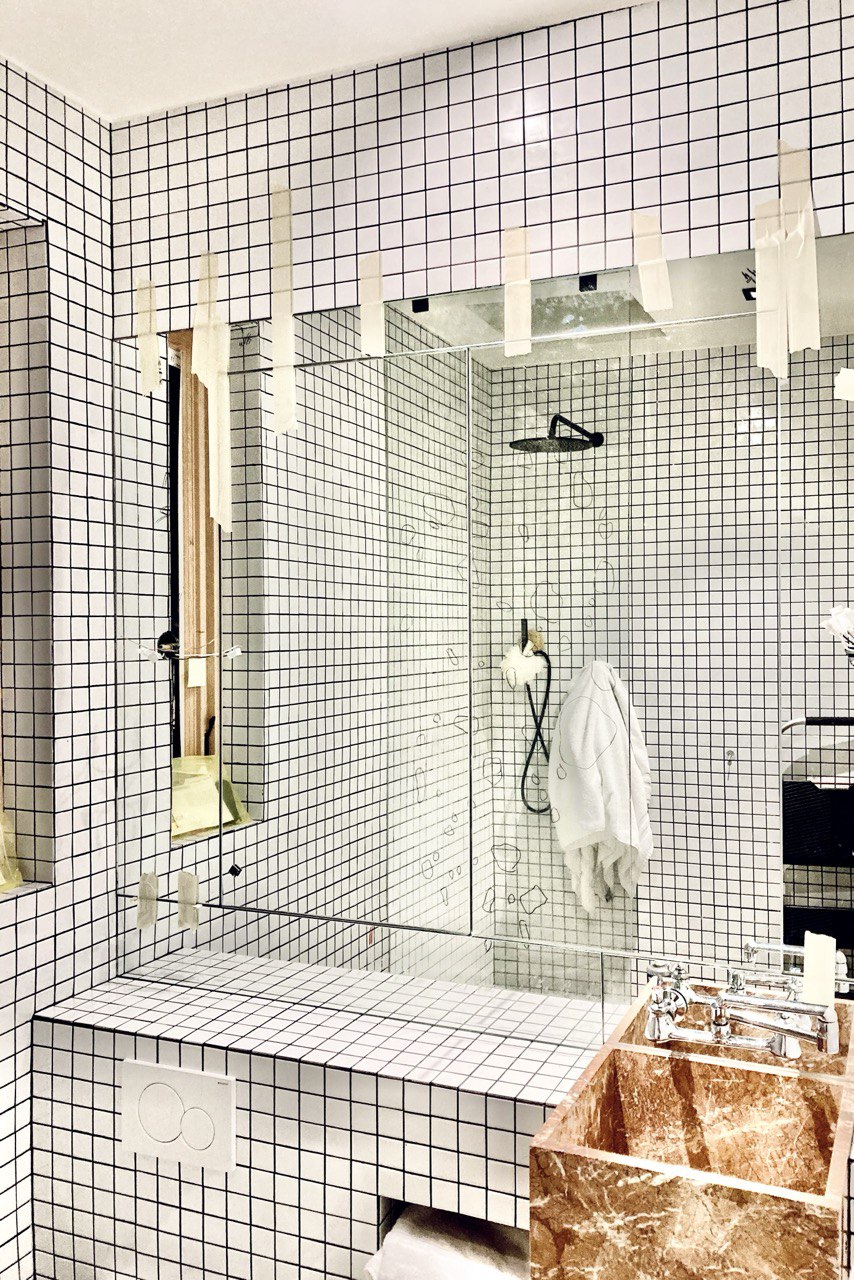Custom bathroom remodel with patterned wall tile by Artbrick