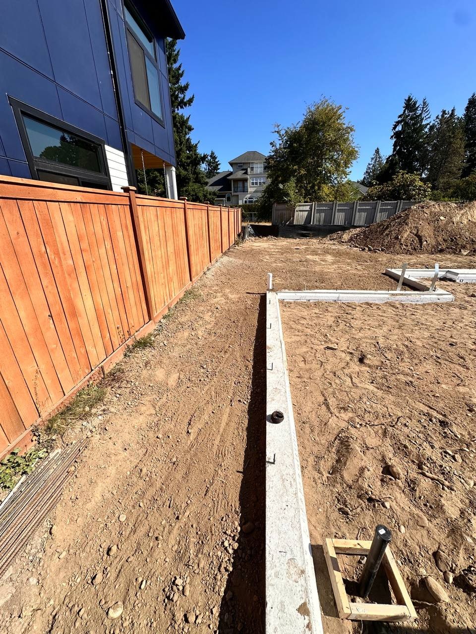 Poured ADU foundation corners with rebar by Artbrick