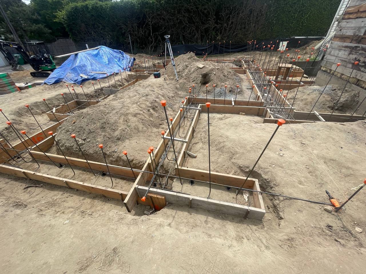 ADU foundation wooden forms in trench by Artbrick