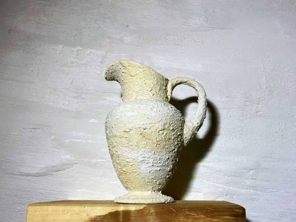 Close-up of textured decorative plaster vessel surface by Artbrick