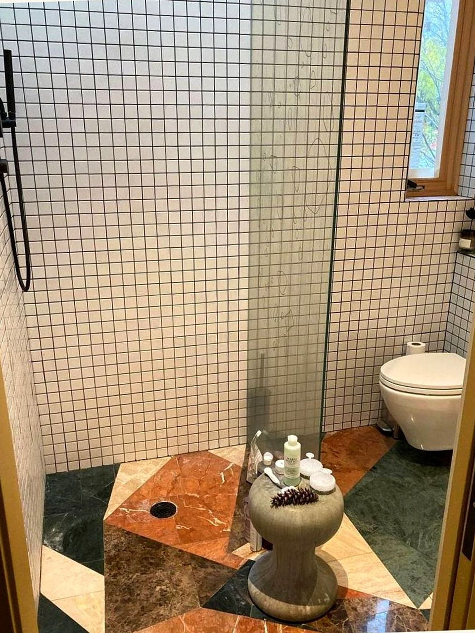 Geometric marble shower and floor tile by Artbrick