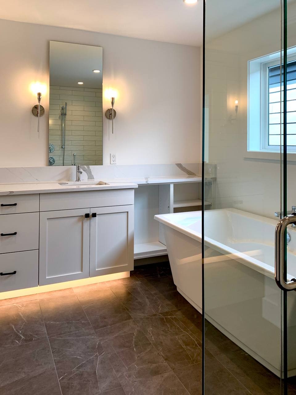 Bathroom vanity and tub in new construction by Artbrick