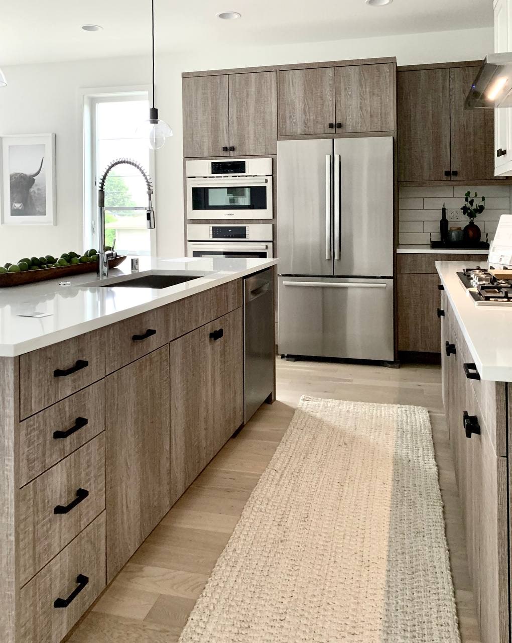 Light wood kitchen in new interior construction by Artbrick