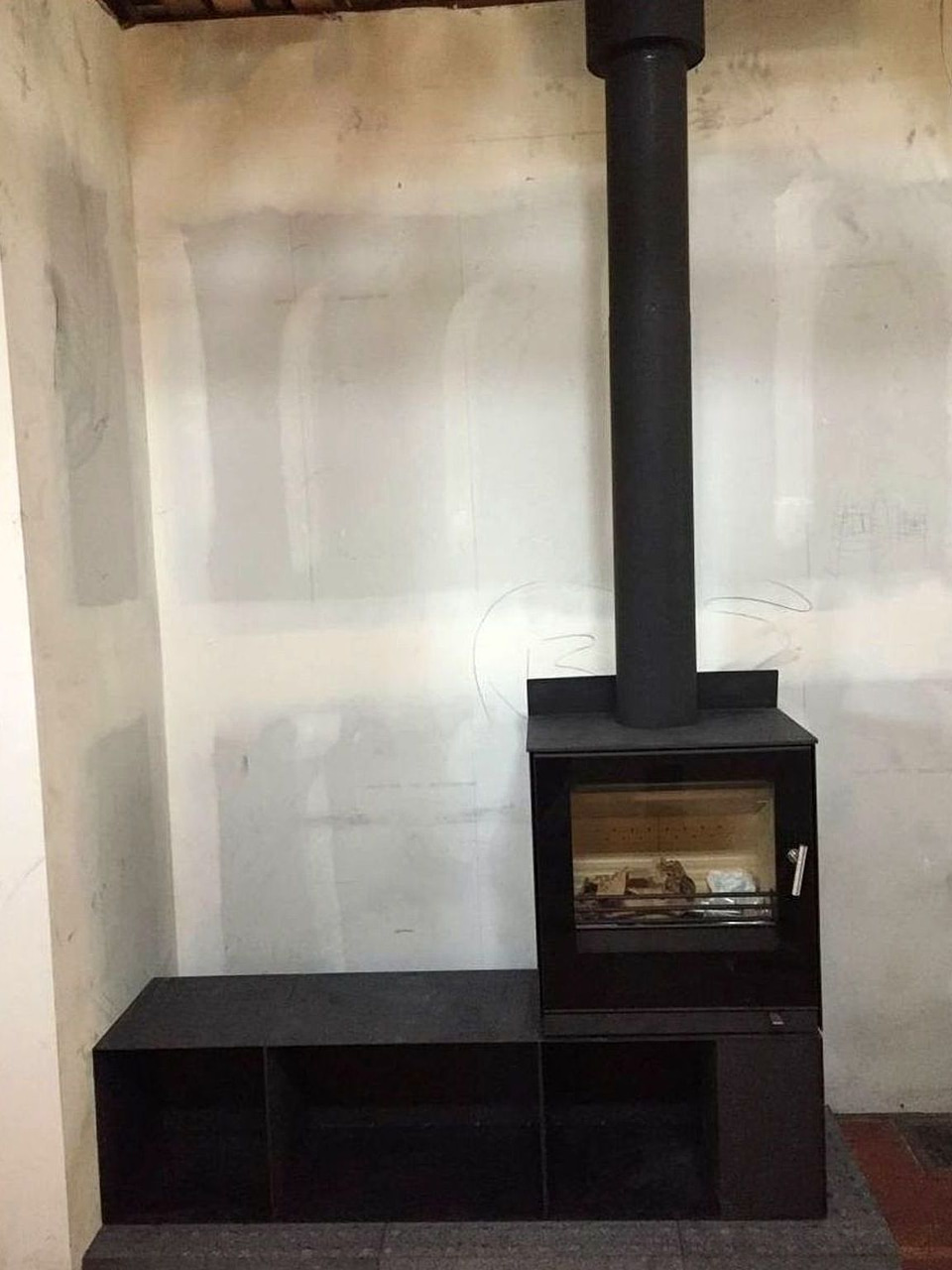 Wood stove installation by Artbrick